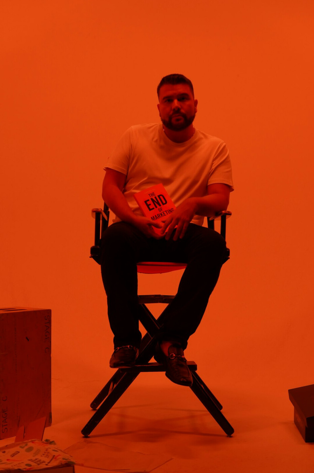 Portrait of a British studio director wearing a headset